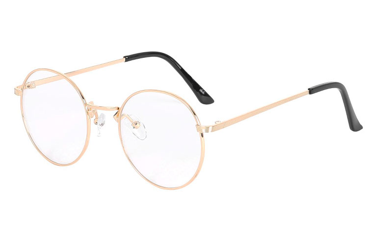 Brille i guldfarvet metal stel, med klare linser uden styrke. Brillen er IKKE HELT rund som den populære  | billige-solbrille-nyheder
