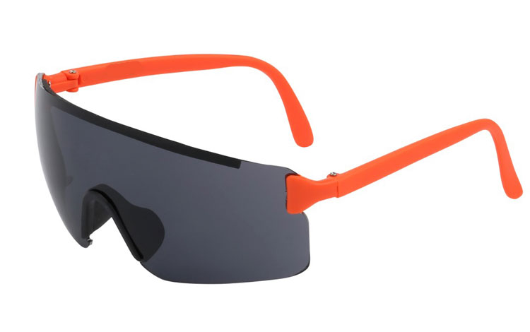 Retro skibrille. Oversize design i sort med orange stænger.  | skibriller