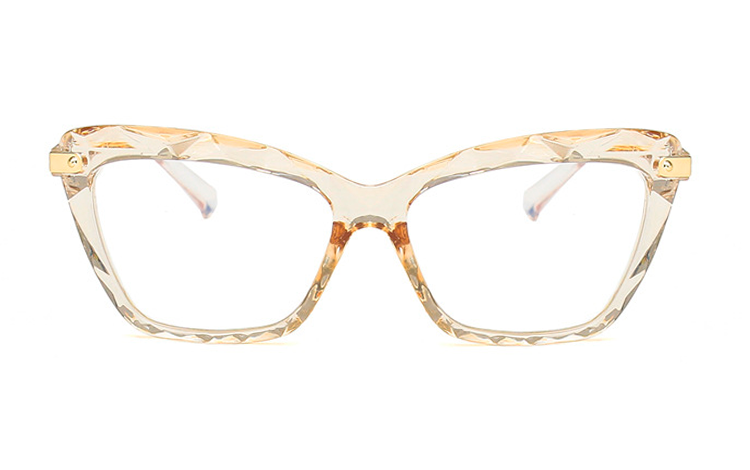  Brillens stel er i feminit design med vintage inspireret mønstret og indgraveret glas. Samtidig med det feminine udtryk, har brillen også en rå kant med det kantede mønster. | klar_glas_briller-2