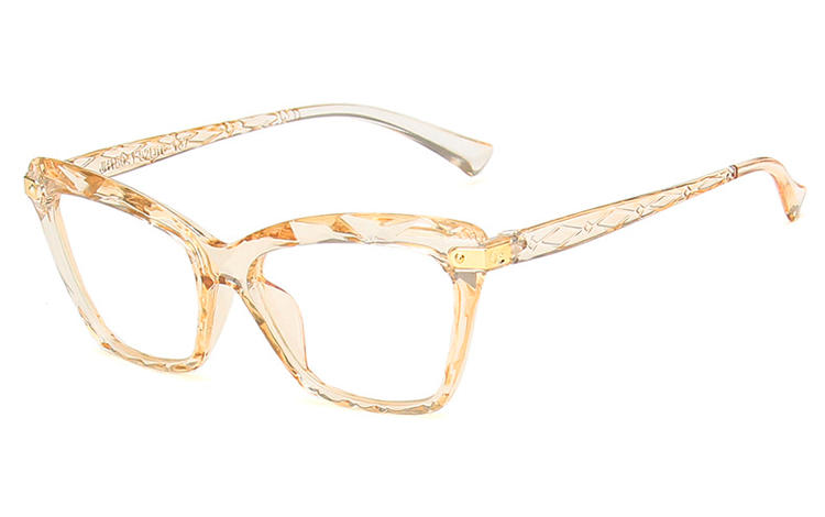  Brillens stel er i feminit design med vintage inspireret mønstret og indgraveret glas. Samtidig med det feminine udtryk, har brillen også en rå kant med det kantede mønster. | klar_glas_briller