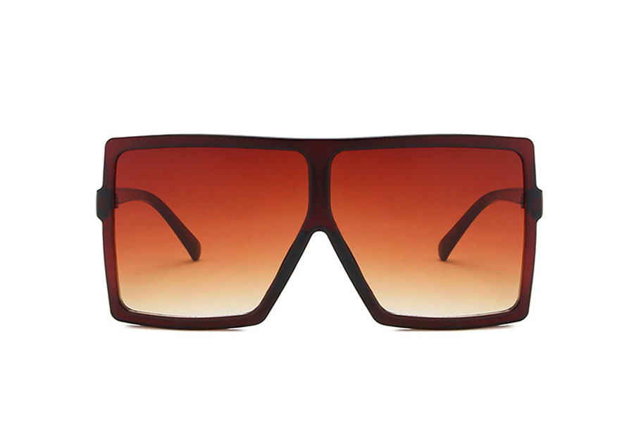 Stellet er halvtransparent i orange-brunt plastik i robust og god kvalitet. Glassene er lysebrune og giver lyst og behagelig udsyn gennem linserne | oversize_store_solbriller-2