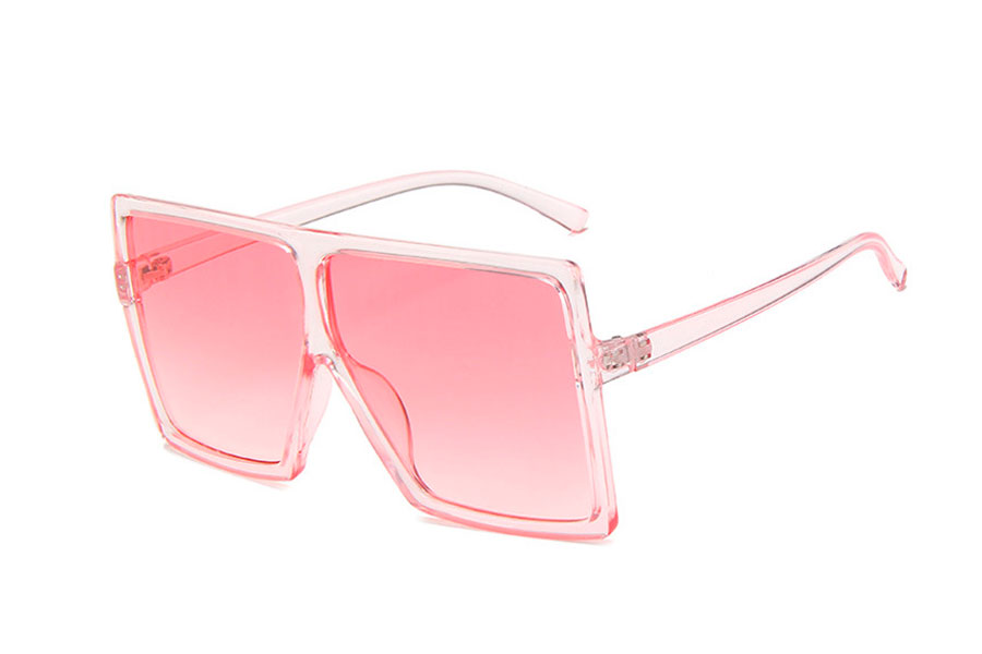 Kæmpe oversize solbrille i stort og fladt design. Stellet er transparent soft lyserødt i robust og god kvalitet | solbriller-farvet-glas